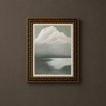 A framed landscape painting of a dramatic white cloud over a calm sea, housed in an ornate dark gold frame, displayed on a dark brown wall.
